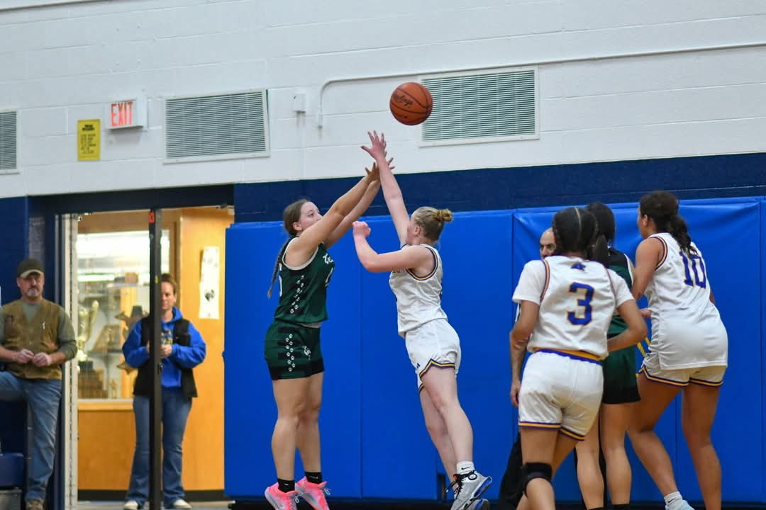 Jeahna Schmidt contesting a shot on defense